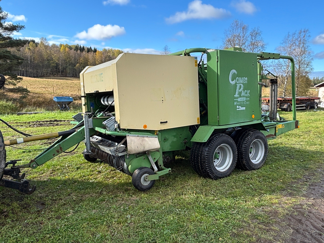 Krone Combi Pack 1250 - Балирка за тркалезни бали: слика 1 Krone Combi Pack 1250 - Балирка за тркалезни бали: слика 1