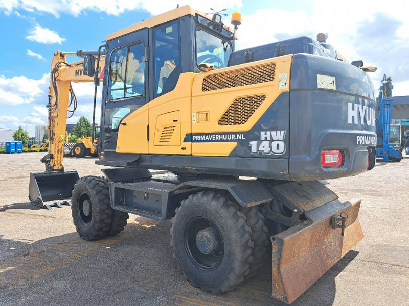 Hyundai HW140 - Багер на тркала: слика 1 Hyundai HW140 - Багер на тркала: слика 1