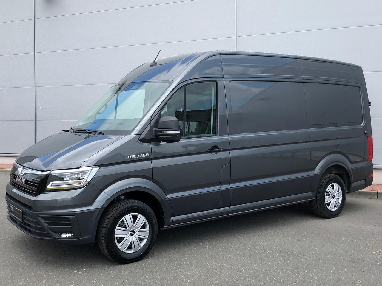 MAN TGE 3.160 L3H3 Kasten LED AHK NAVI GRA RWD SITZH - Автомобил: слика 1 MAN TGE 3.160 L3H3 Kasten LED AHK NAVI GRA RWD SITZH - Автомобил: слика 1
