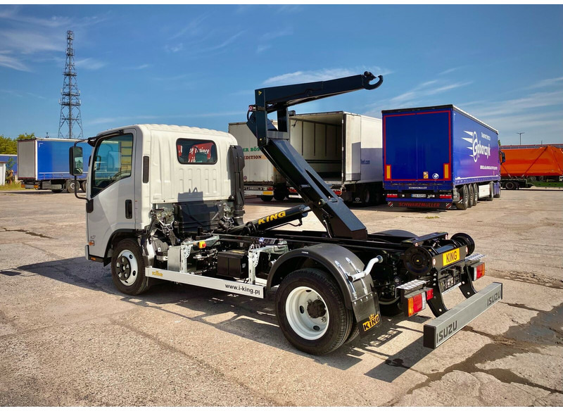 Isuzu M27 - Камион со кука за подигање: слика 1 Isuzu M27 - Камион со кука за подигање: слика 1