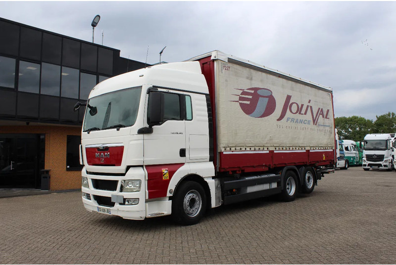 MAN TGX 26.440 * EURO5 * 6X2 * LIFT AXLE * - Камион со церада: слика 2 MAN TGX 26.440 * EURO5 * 6X2 * LIFT AXLE * - Камион со церада: слика 2