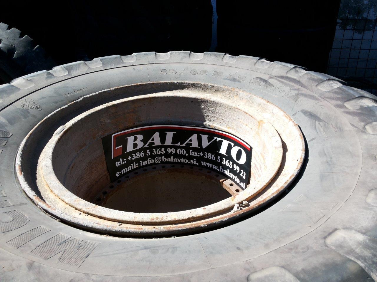 Caterpillar 988B - Комплетно тркало за Градежна машина: слика 1 Caterpillar 988B - Комплетно тркало за Градежна машина: слика 1