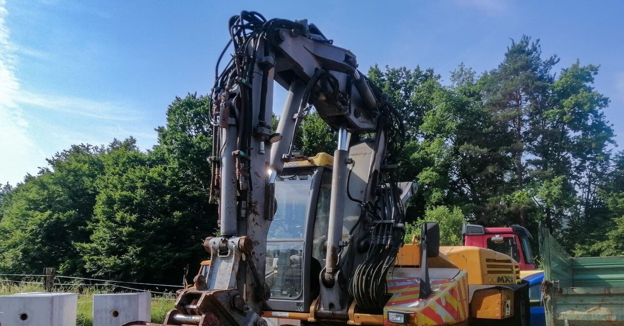 Mecalac 14 MXT - Багер на тркала: слика 1 Mecalac 14 MXT - Багер на тркала: слика 1