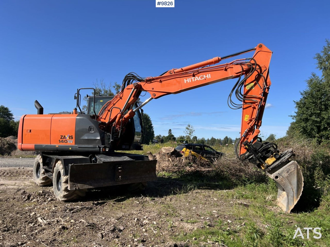 Hitachi ZX140 W-5B with rotor and planer bucket - Багер на тркала: слика 1 Hitachi ZX140 W-5B with rotor and planer bucket - Багер на тркала: слика 1