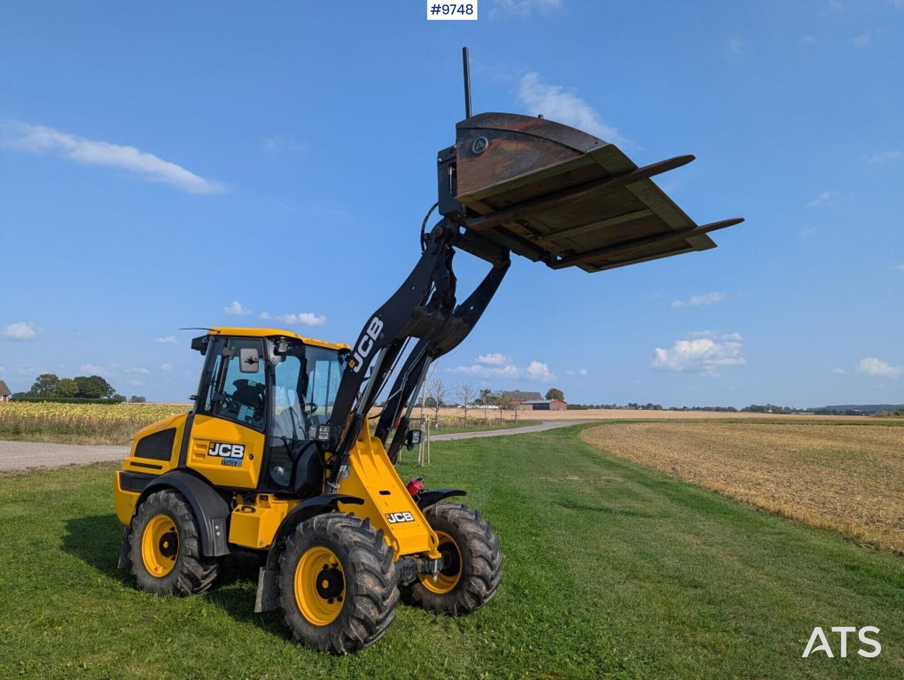 Wheel loader JCB 409 Stage V Nordic Edition 40km/h with attachments - Натоварувач на тркала: слика 2 Wheel loader JCB 409 Stage V Nordic Edition 40km/h with attachments - Натоварувач на тркала: слика 2