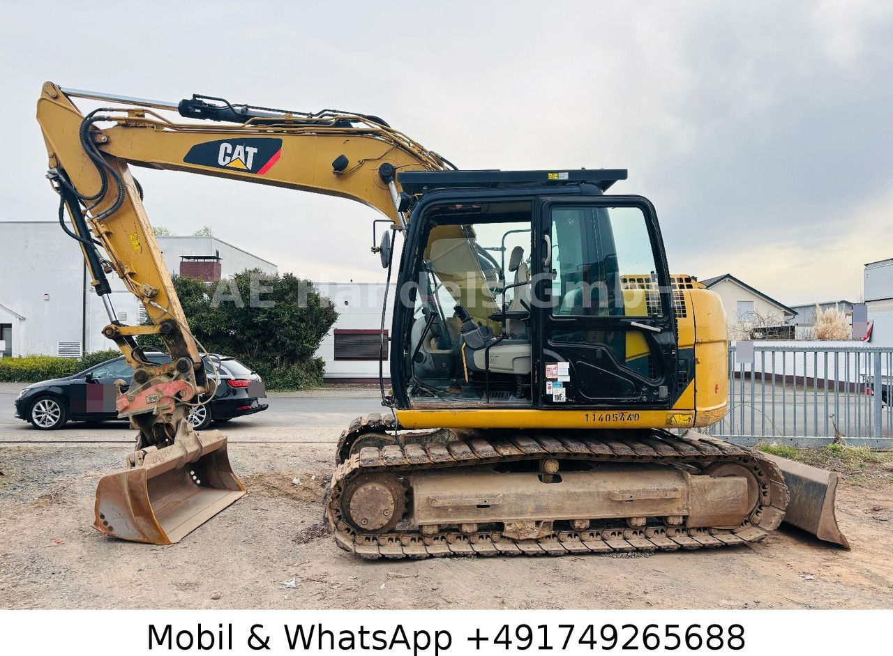 CAT 311D *6600Std./Schnellwechsler/Schaufel/Klima - Багер гасеничар: слика 3 CAT 311D *6600Std./Schnellwechsler/Schaufel/Klima - Багер гасеничар: слика 3