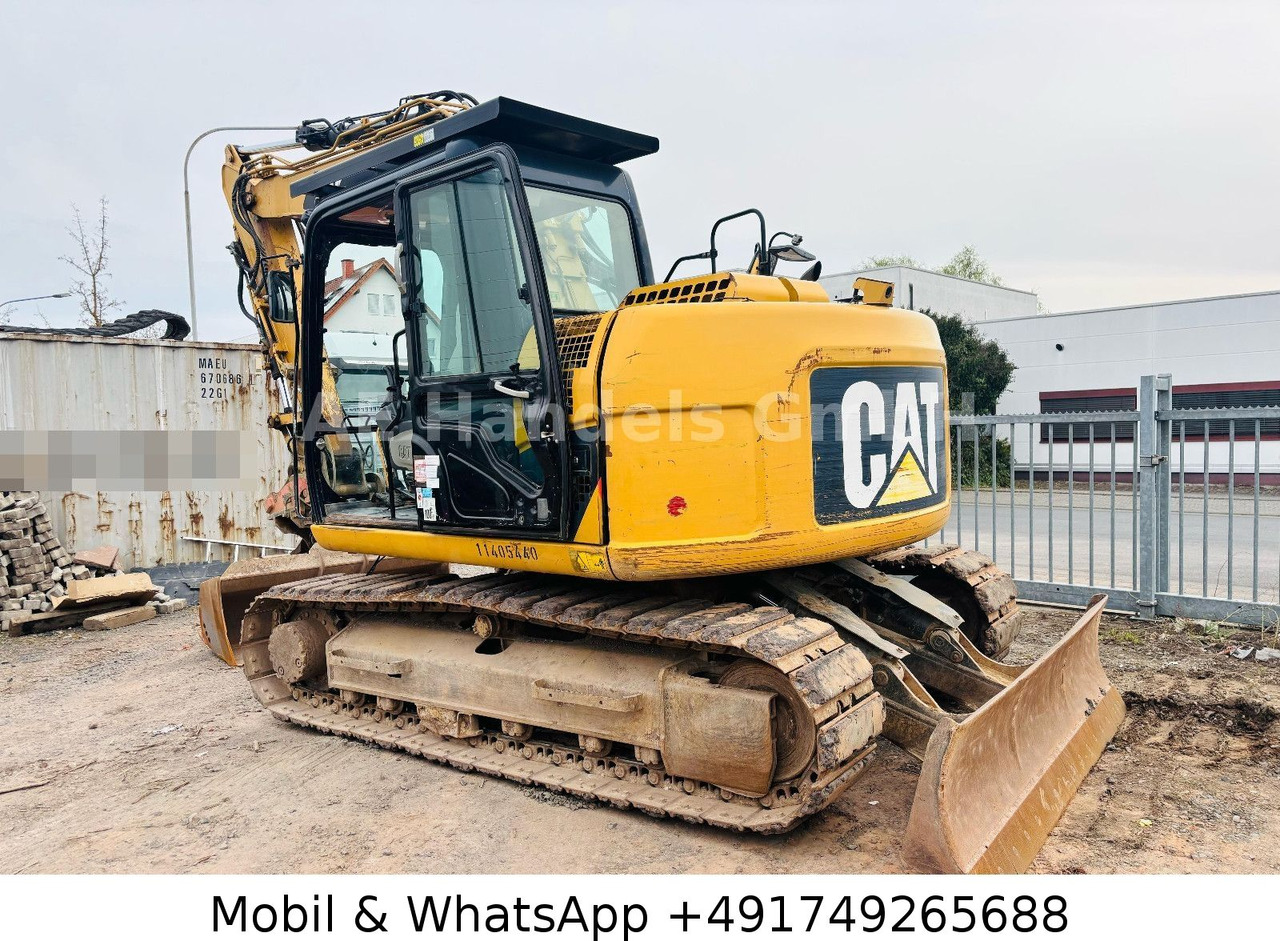 CAT 311D *6600Std./Schnellwechsler/Schaufel/Klima - Багер гасеничар: слика 5 CAT 311D *6600Std./Schnellwechsler/Schaufel/Klima - Багер гасеничар: слика 5