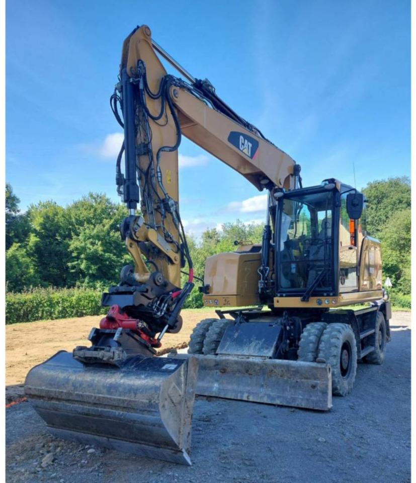 CAT M315F - Багер на тркала: слика 1 CAT M315F - Багер на тркала: слика 1