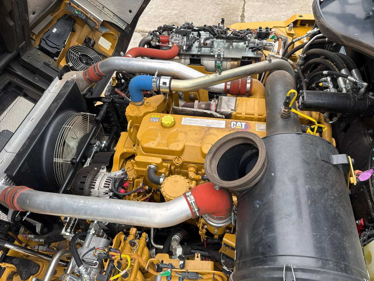 Зглобен истоварувач CAT 730: слика 23 Зглобен истоварувач CAT 730: слика 23