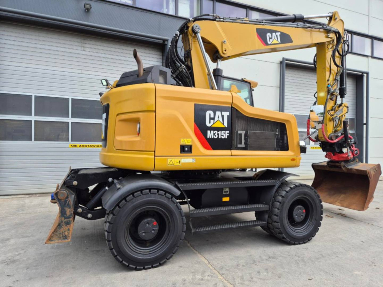 CAT M315F - Багер на тркала: слика 3 CAT M315F - Багер на тркала: слика 3