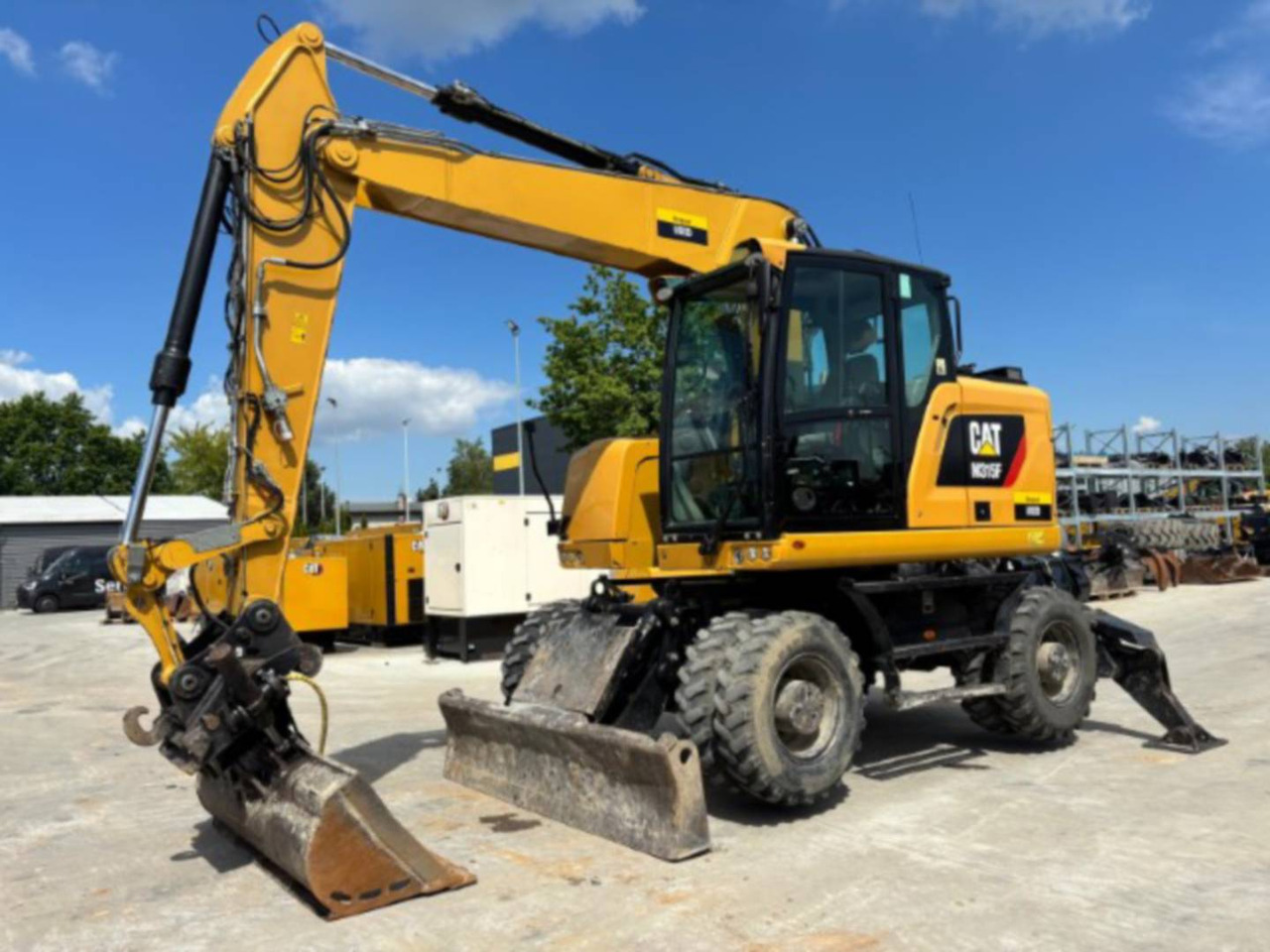 CAT M315F - Багер на тркала: слика 1 CAT M315F - Багер на тркала: слика 1