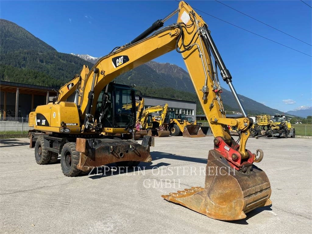 CAT M316D - Багер на тркала: слика 1 CAT M316D - Багер на тркала: слика 1
