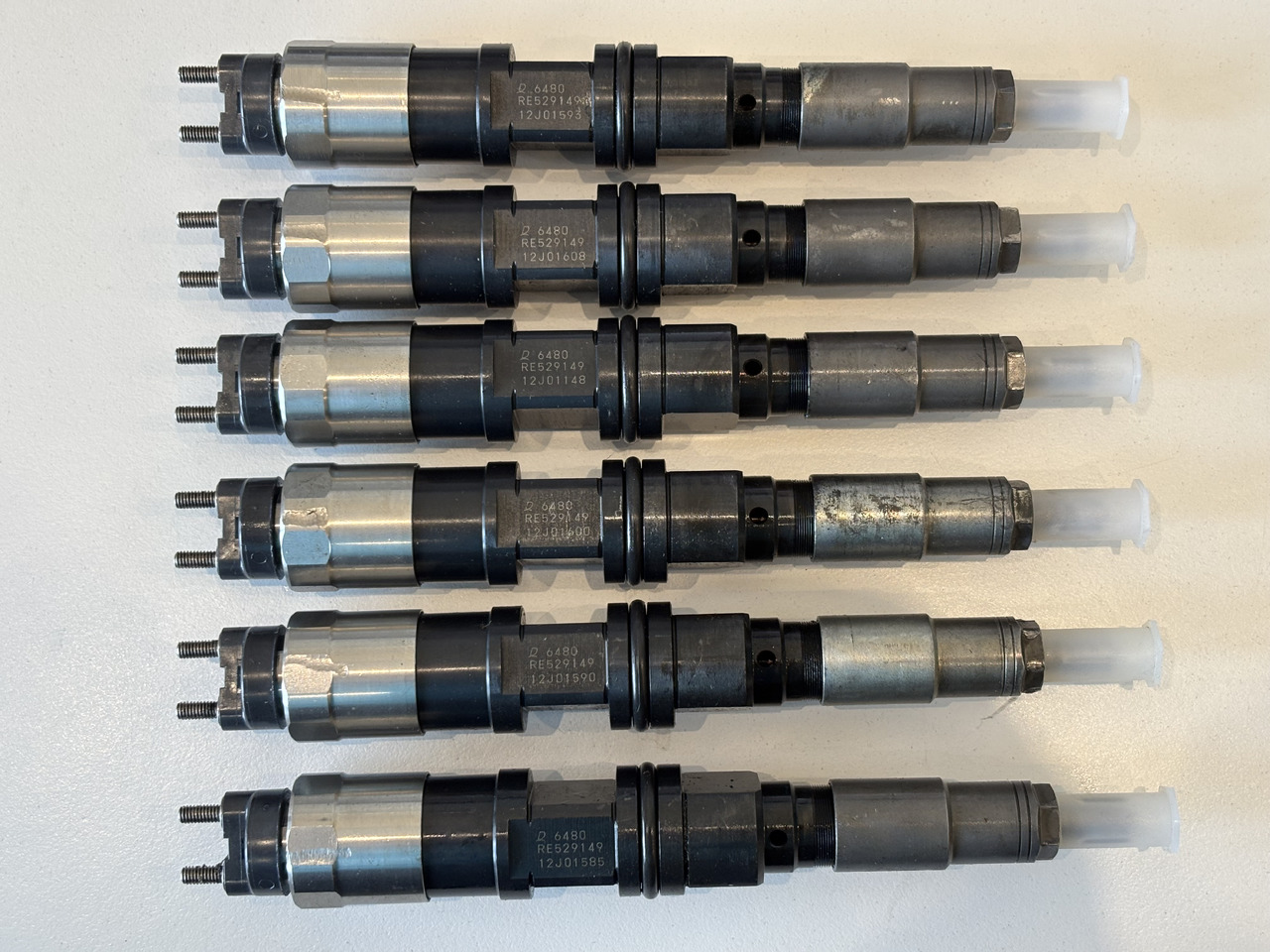 JOHN DEERE Wtryskiwacz RE529149, RE528407, RE546776 Po regeneracji - Инјектор за Земјоделска машина: слика 3 JOHN DEERE Wtryskiwacz RE529149, RE528407, RE546776 Po regeneracji - Инјектор за Земјоделска машина: слика 3