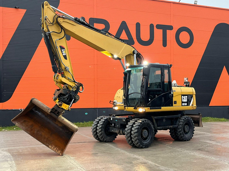 Caterpillar M316D / ROTOTILT/ AC / CENTRAL LUBRICATION / + EXTRA BUCKET - Багер на тркала: слика 1 Caterpillar M316D / ROTOTILT/ AC / CENTRAL LUBRICATION / + EXTRA BUCKET - Багер на тркала: слика 1