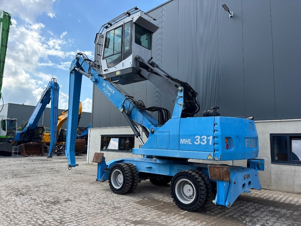 Fuchs MHL 331 D - MHL 335 - MHL 340 - Справувач со отпад/ Индустрија: слика 2 Fuchs MHL 331 D - MHL 335 - MHL 340 - Справувач со отпад/ Индустрија: слика 2