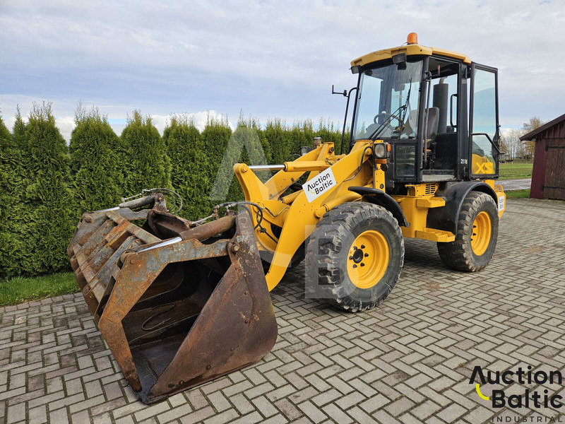 JCB 409 B - Натоварувач на тркала: слика 1 JCB 409 B - Натоварувач на тркала: слика 1