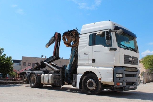 MAN TGA 26.360 FG 6x2 LL GERGEN Abroll + Penz Kran - Камион со кука за подигање, Камион со кран: слика 1 MAN TGA 26.360 FG 6x2 LL GERGEN Abroll + Penz Kran - Камион со кука за подигање, Камион со кран: слика 1