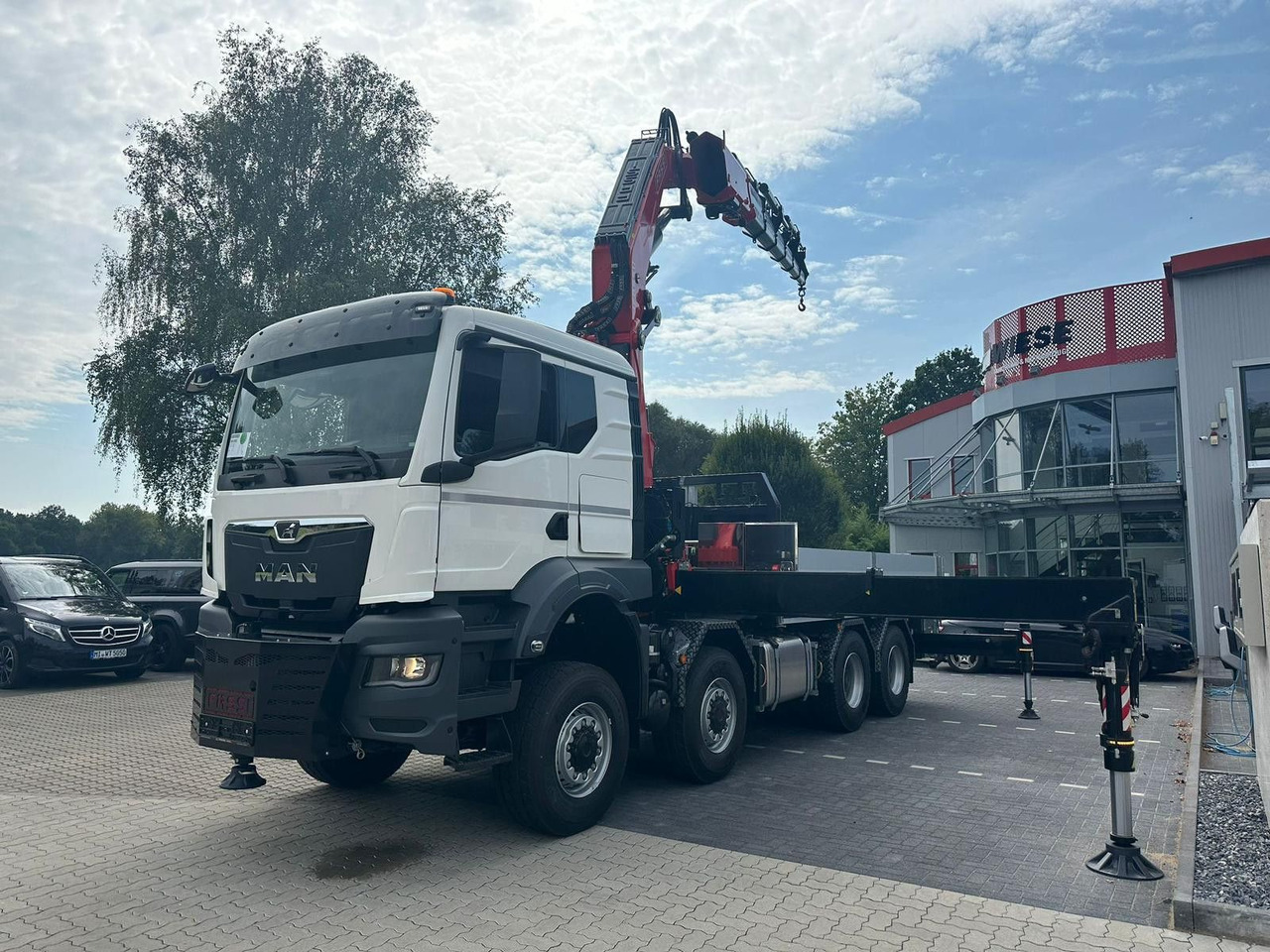 MAN TGS 41.520 8x8 mit Fassi Ladekran F710RA.2.26 - Камион со кран: слика 2 MAN TGS 41.520 8x8 mit Fassi Ladekran F710RA.2.26 - Камион со кран: слика 2