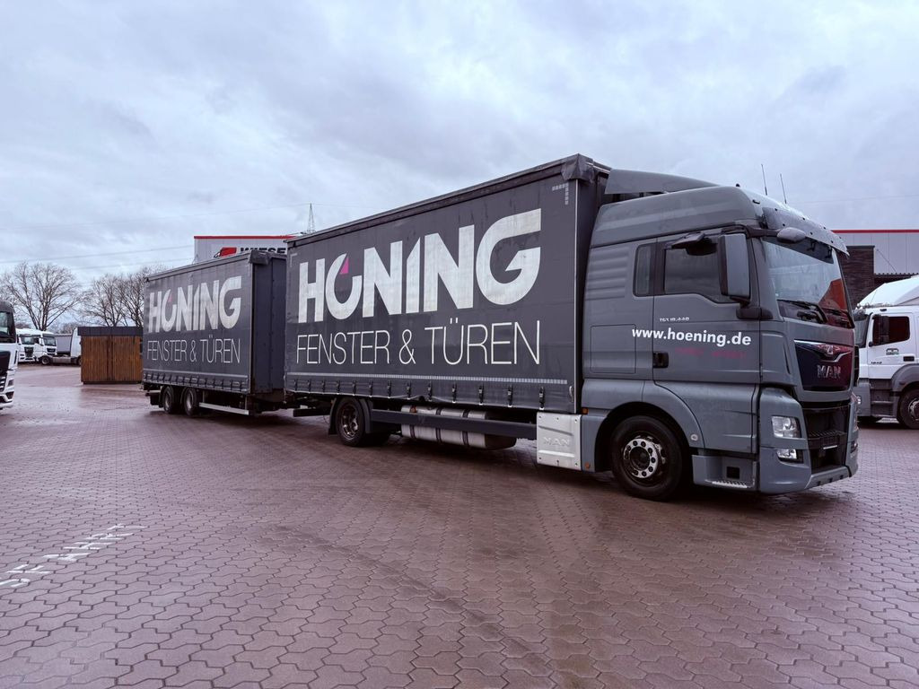 MAN TGX 18.440 LL Volumen LKW mit Staplerhalterung - Камион со церада: слика 1 MAN TGX 18.440 LL Volumen LKW mit Staplerhalterung - Камион со церада: слика 1