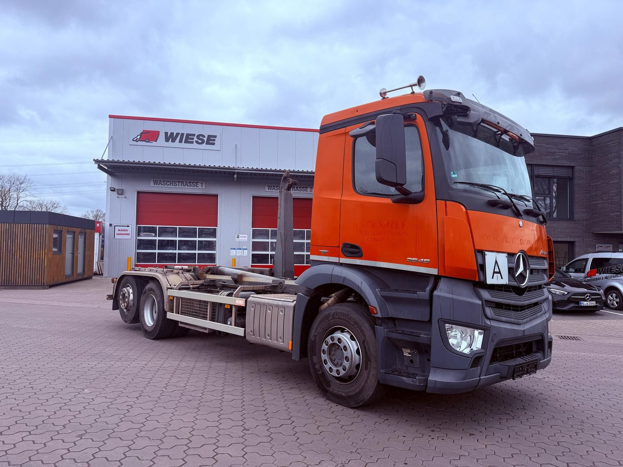 Mercedes-Benz Antos 2545 Abrollkipper Meiler2070 Kupplung Neu - Камион со кука за подигање: слика 1 Mercedes-Benz Antos 2545 Abrollkipper Meiler2070 Kupplung Neu - Камион со кука за подигање: слика 1