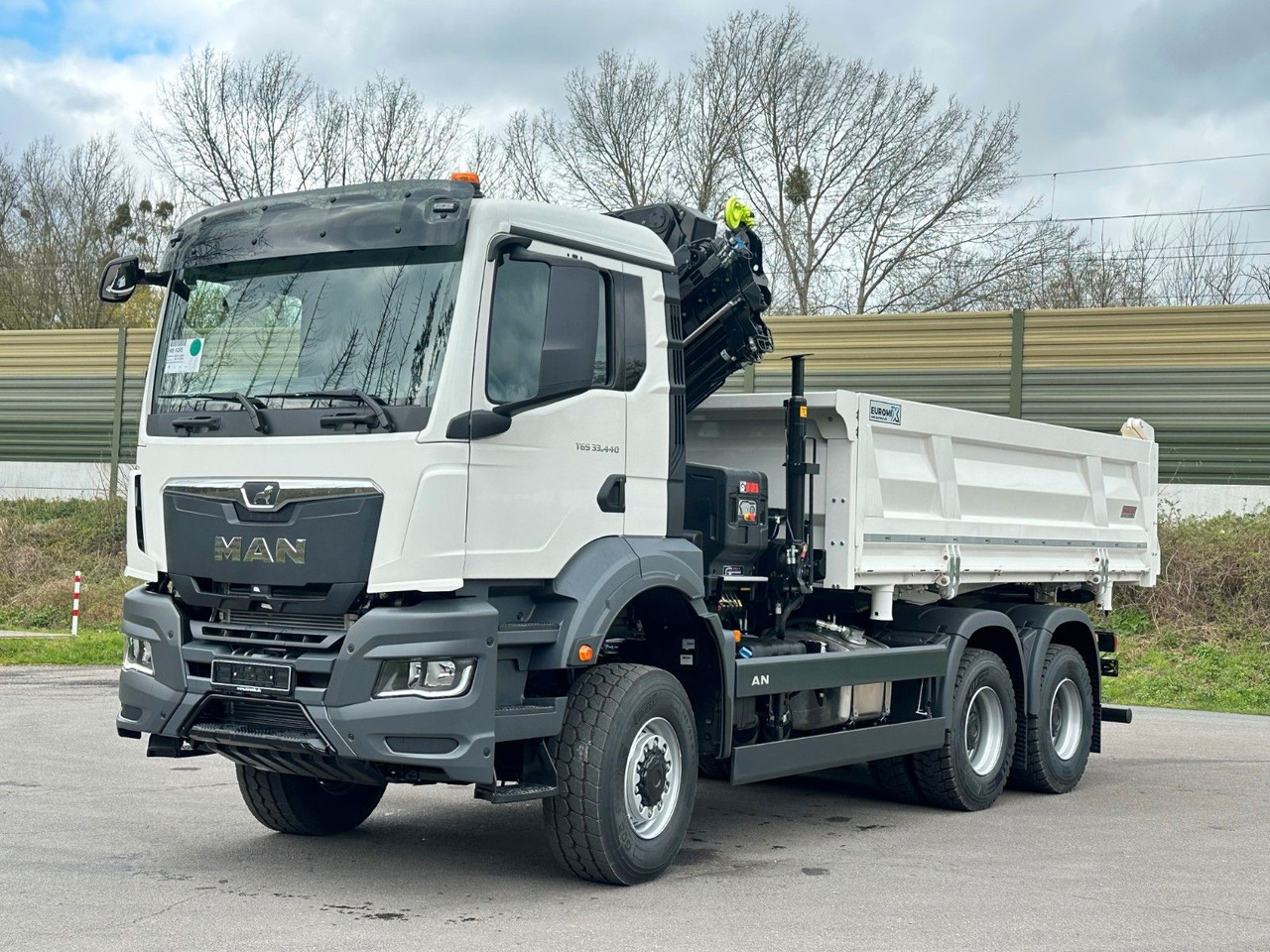 MAN TGS 33.440 6x6 /3-Seiten- Kipper / HIAB 228-4 - Кипер, Камион со кран: слика 2 MAN TGS 33.440 6x6 /3-Seiten- Kipper / HIAB 228-4 - Кипер, Камион со кран: слика 2