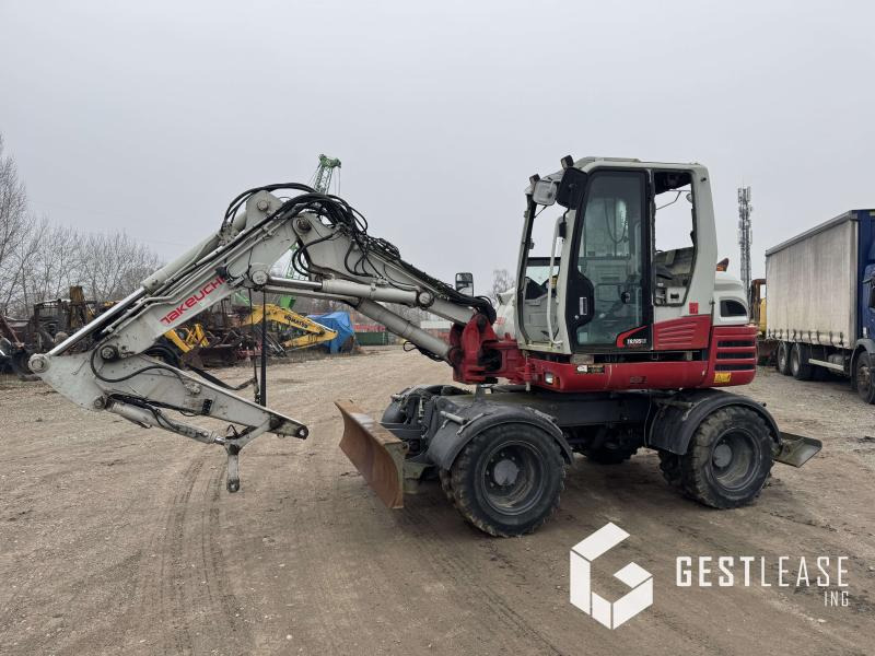 Takeuchi TB295W - Багер на тркала: слика 1 Takeuchi TB295W - Багер на тркала: слика 1