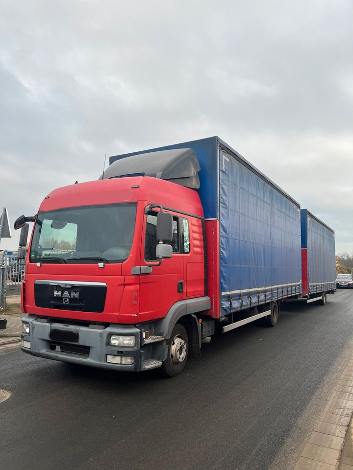 MAN 8.220 4X2 Pritschenwagen - Камион со церада: слика 1 MAN 8.220 4X2 Pritschenwagen - Камион со церада: слика 1