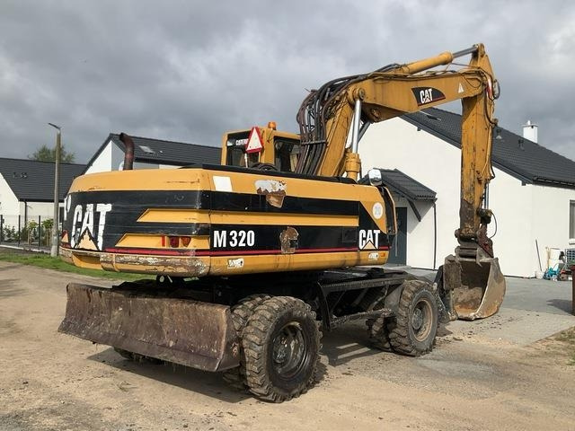 CAT M320 - Багер на тркала: слика 4 CAT M320 - Багер на тркала: слика 4