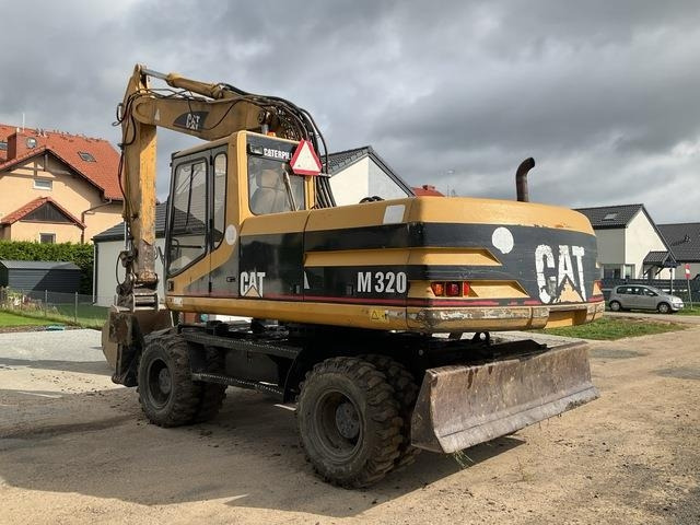 CAT M320 - Багер на тркала: слика 3 CAT M320 - Багер на тркала: слика 3