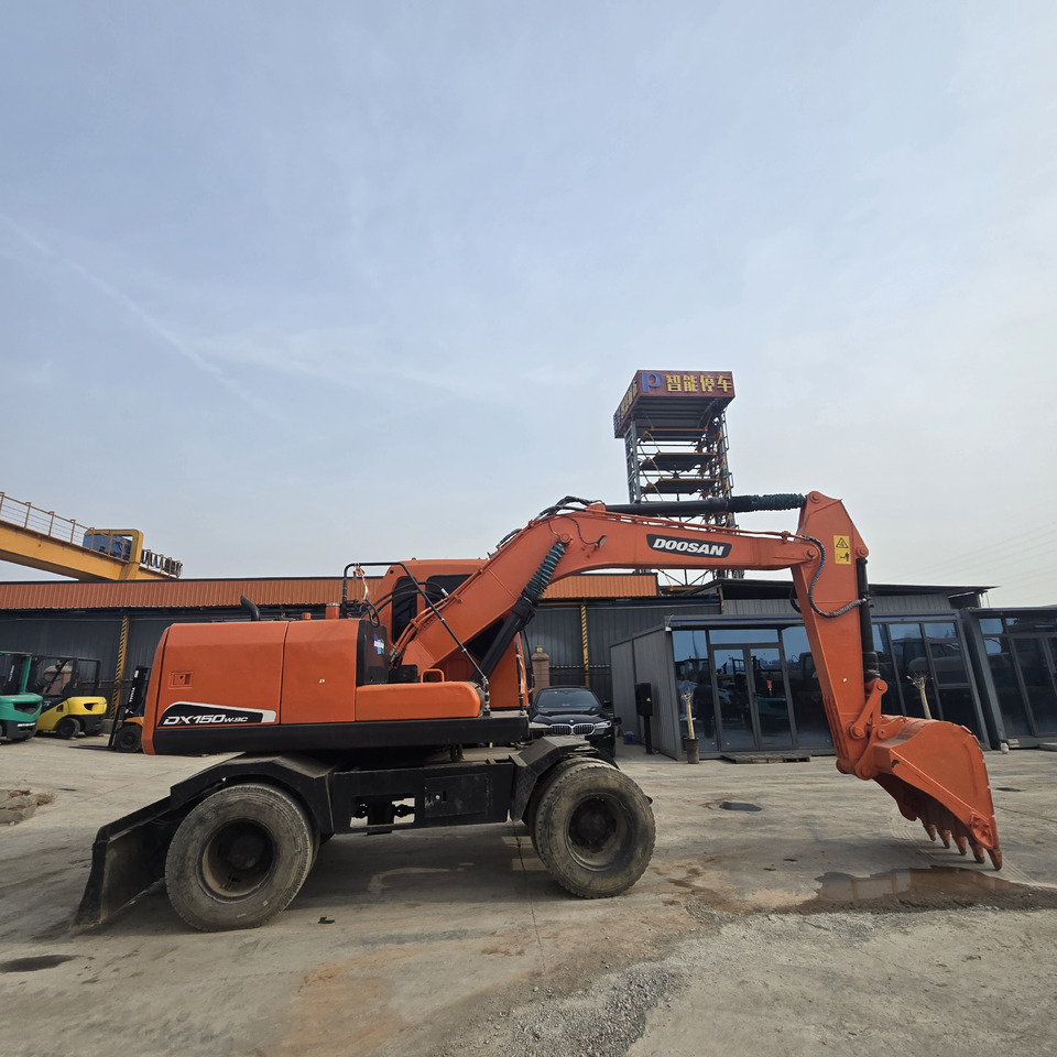 DOOSAN DX150W - Багер на тркала: слика 4 DOOSAN DX150W - Багер на тркала: слика 4