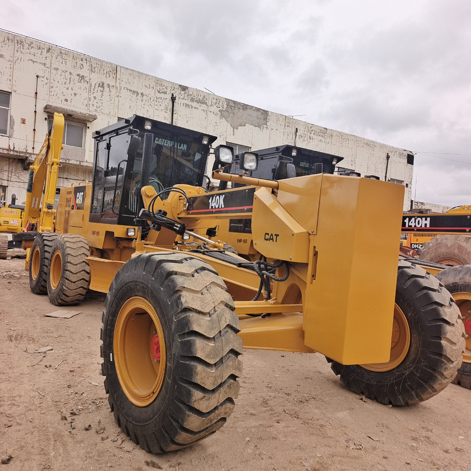 CATERPILLAR 140K CAT 140H 140G - Порамнувач: слика 1 CATERPILLAR 140K CAT 140H 140G - Порамнувач: слика 1