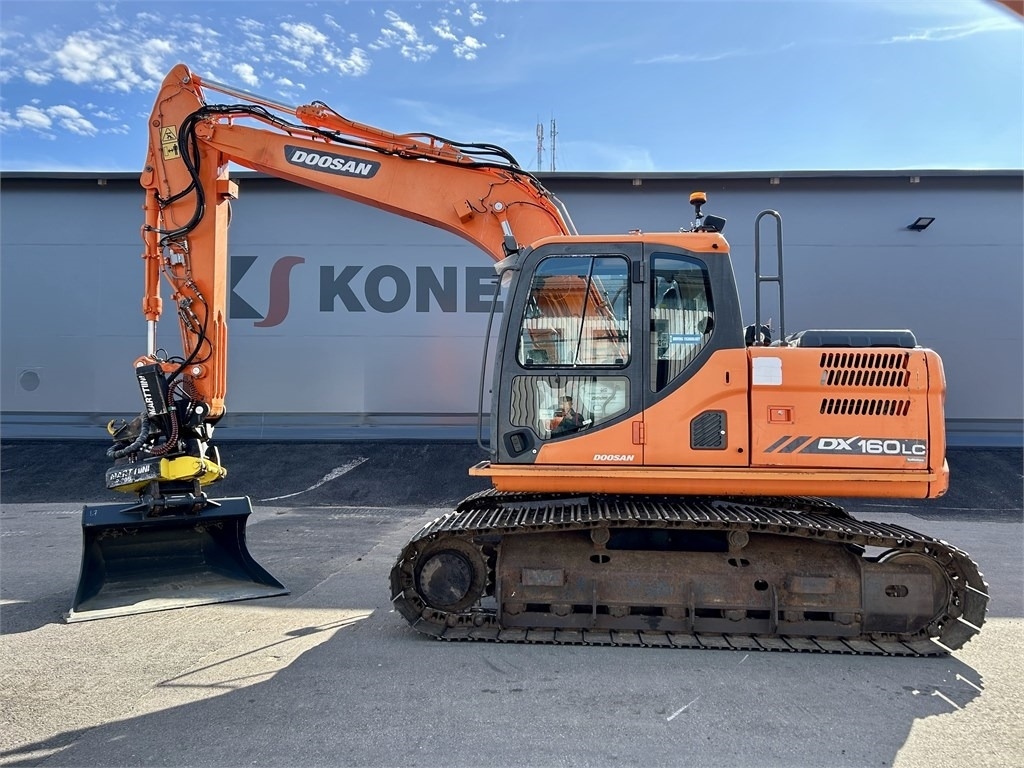 Doosan DX160LC-3 KALLISTAJA+PYÖRITTÄJÄ - Багер гасеничар: слика 1 Doosan DX160LC-3 KALLISTAJA+PYÖRITTÄJÄ - Багер гасеничар: слика 1
