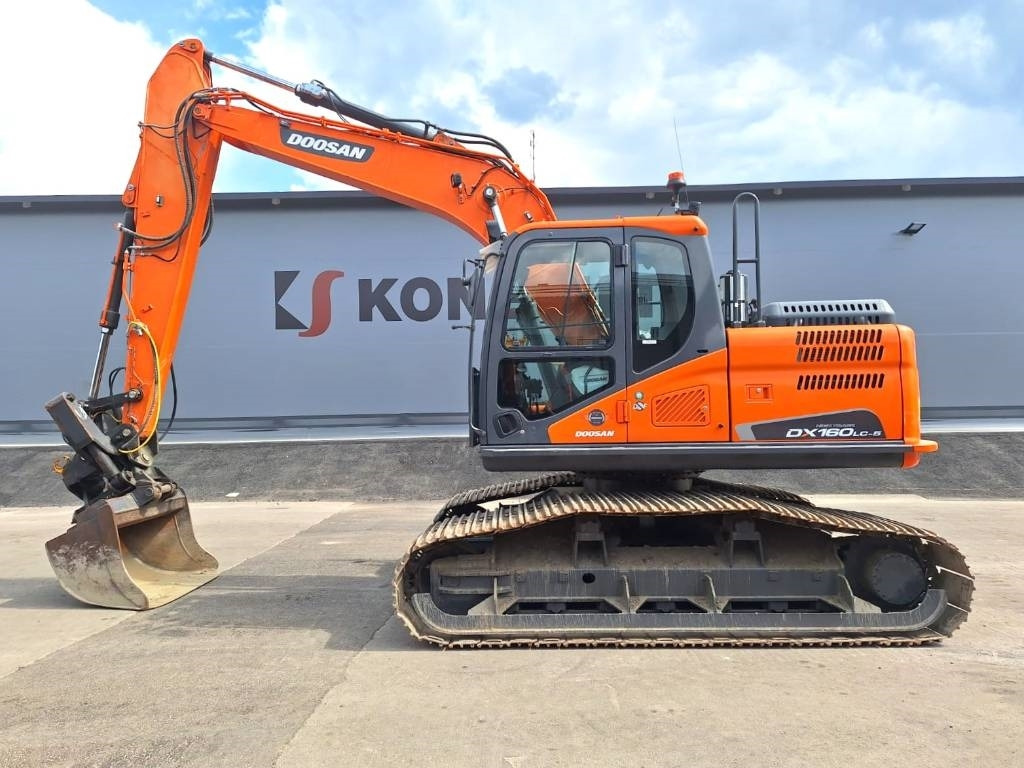 Doosan DX160LCH-5 METSÄMALLI KALLISTAJALLA - Багер гасеничар: слика 1 Doosan DX160LCH-5 METSÄMALLI KALLISTAJALLA - Багер гасеничар: слика 1