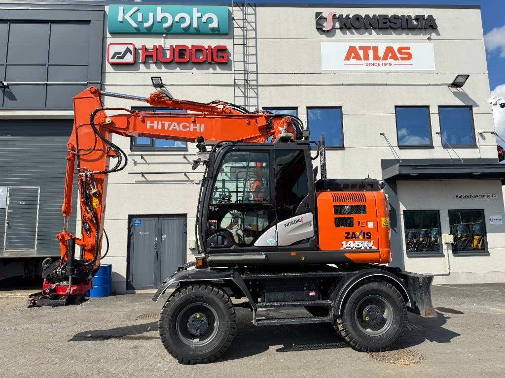 Hitachi ZX145W-6 PYÖRITTÄJÄLLÄ - Багер на тркала: слика 1 Hitachi ZX145W-6 PYÖRITTÄJÄLLÄ - Багер на тркала: слика 1