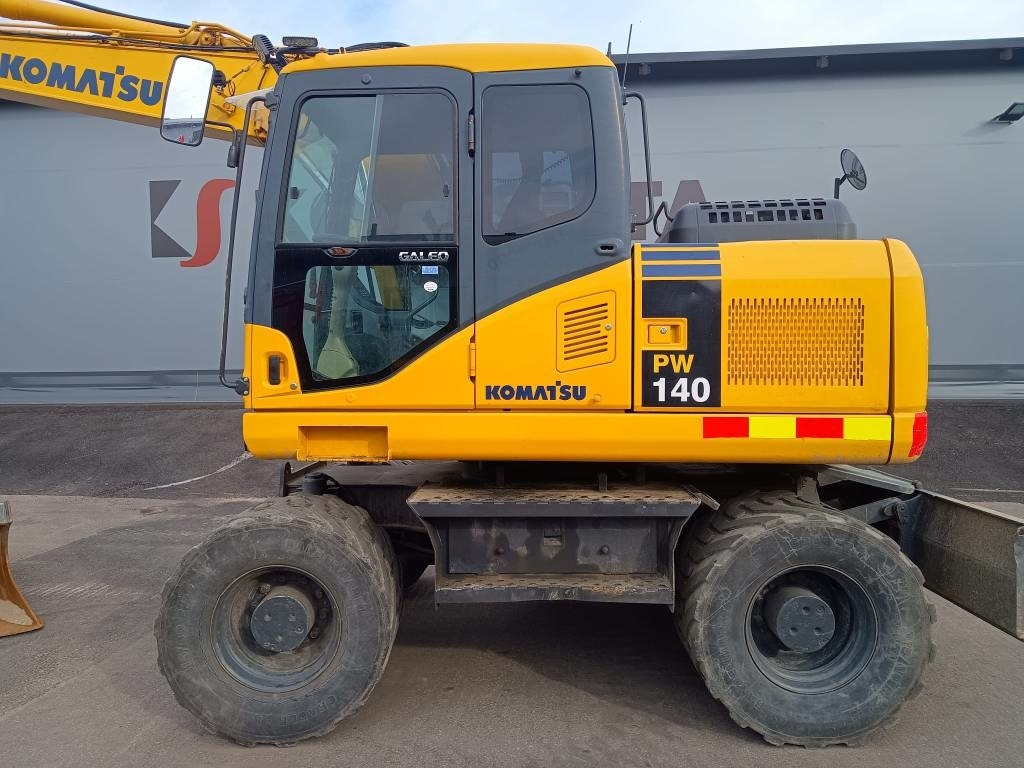 Komatsu PW140-7 PYÖRITTÄJÄLLÄ - Багер на тркала: слика 2 Komatsu PW140-7 PYÖRITTÄJÄLLÄ - Багер на тркала: слика 2