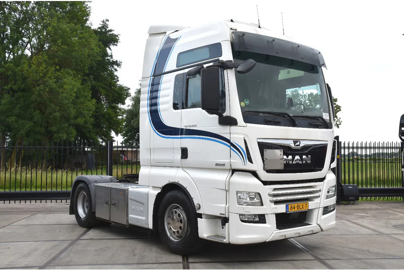 MAN TGX 18.420 - EURO 6 - ADR FL - PARK. AIRCO - NAVI - PTO - XENON LIGHTS - TOP CONDITION - - Камион влекач: слика 1 MAN TGX 18.420 - EURO 6 - ADR FL - PARK. AIRCO - NAVI - PTO - XENON LIGHTS - TOP CONDITION - - Камион влекач: слика 1