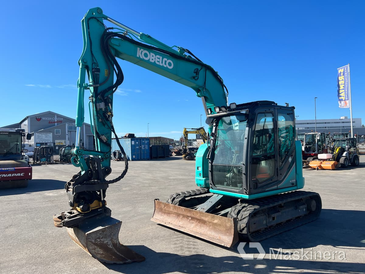 Grävmaskin Kobelco SK75SR-3E - Багер гасеничар: слика 1 Grävmaskin Kobelco SK75SR-3E - Багер гасеничар: слика 1