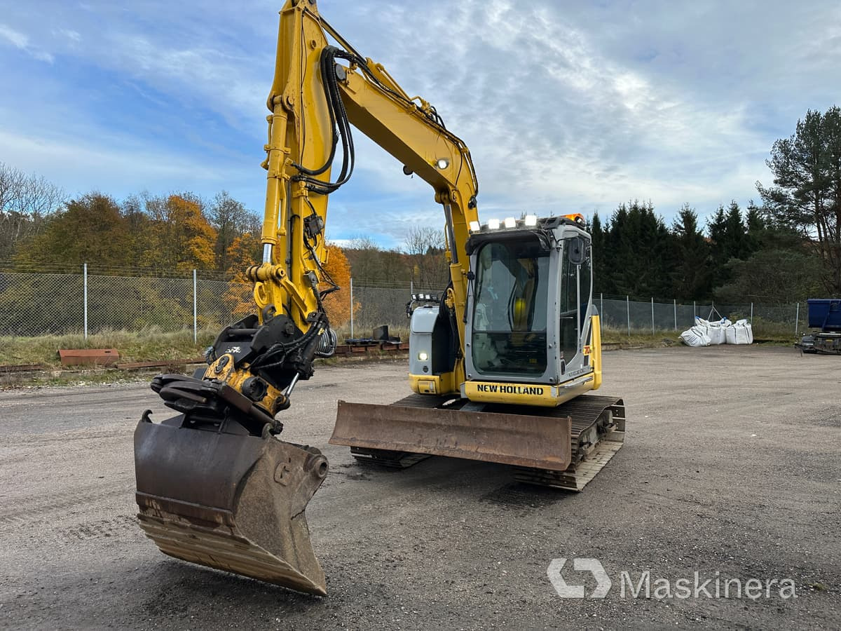 Grävmaskin New Holland Kobelco E70BSR-2 - Багер гасеничар: слика 3 Grävmaskin New Holland Kobelco E70BSR-2 - Багер гасеничар: слика 3