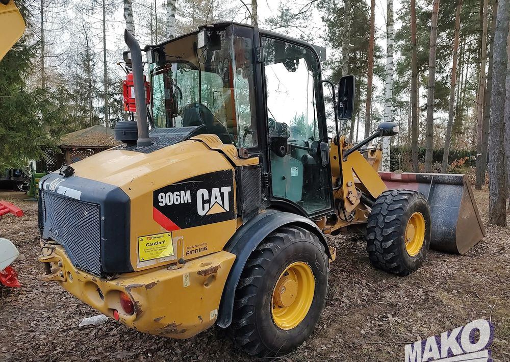 Caterpillar 906M - Натоварувач на тркала: слика 1 Caterpillar 906M - Натоварувач на тркала: слика 1