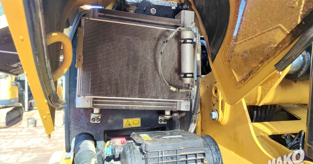 Багер на тркала Caterpillar M313D: слика 9