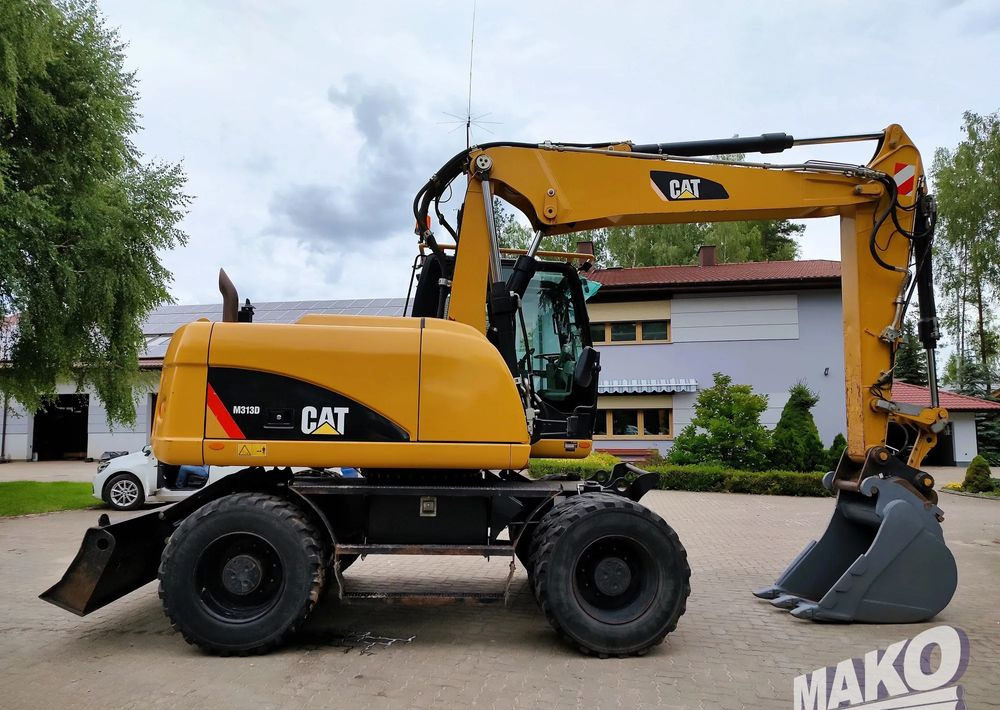 Caterpillar M313D - Багер на тркала: слика 5 Caterpillar M313D - Багер на тркала: слика 5