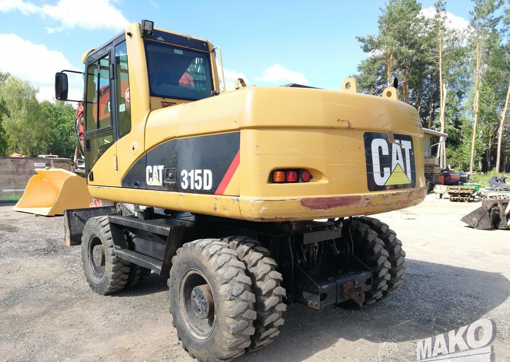 Caterpillar M315 C - Багер на тркала: слика 3 Caterpillar M315 C - Багер на тркала: слика 3