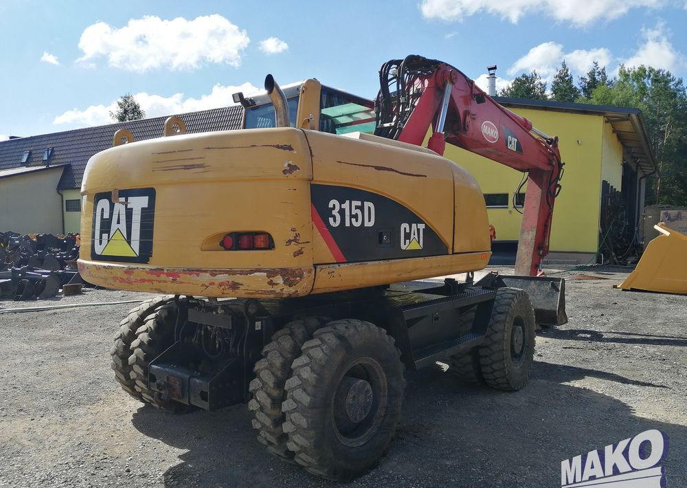 Caterpillar M315 C - Багер на тркала: слика 5 Caterpillar M315 C - Багер на тркала: слика 5