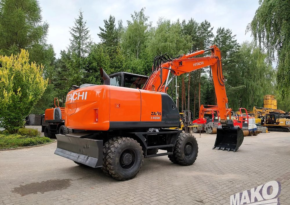 Hitachi ZX 140 - Багер на тркала: слика 4 Hitachi ZX 140 - Багер на тркала: слика 4