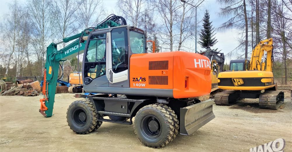 Hitachi ZX140W-3 - Багер на тркала: слика 2 Hitachi ZX140W-3 - Багер на тркала: слика 2