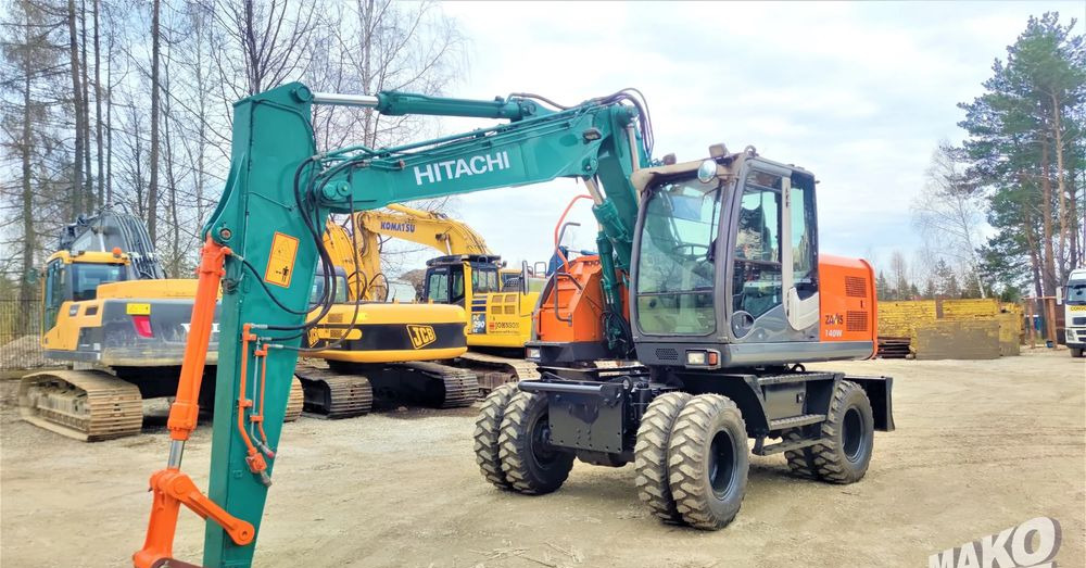 Багер на тркала Hitachi ZX140W-3: слика 7