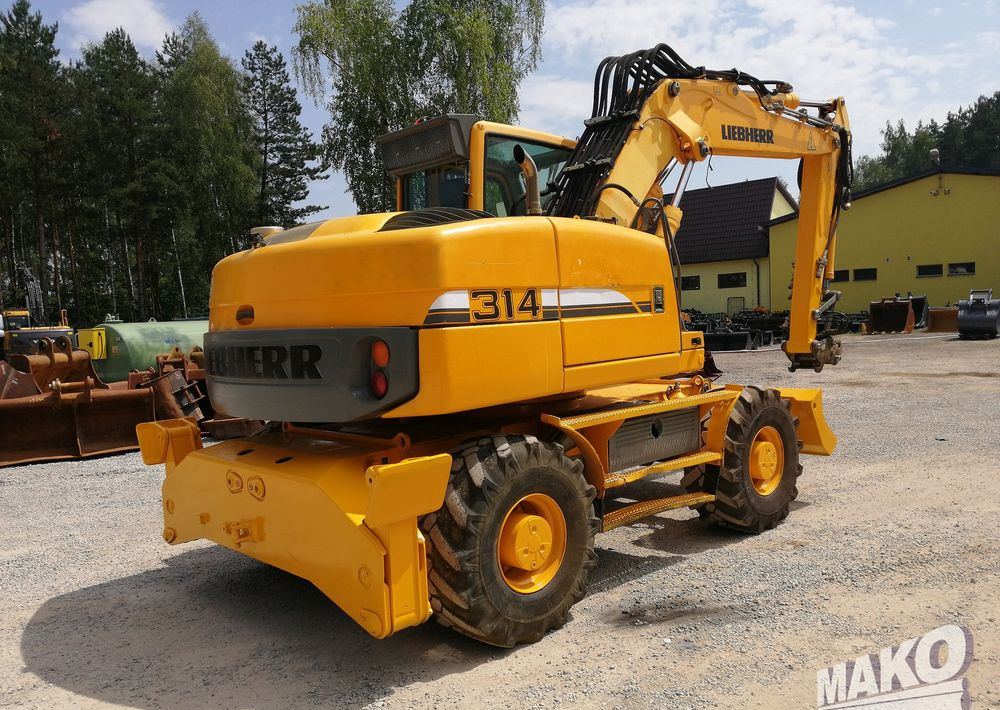 Liebherr A 314 Litronic - Багер на тркала: слика 5 Liebherr A 314 Litronic - Багер на тркала: слика 5