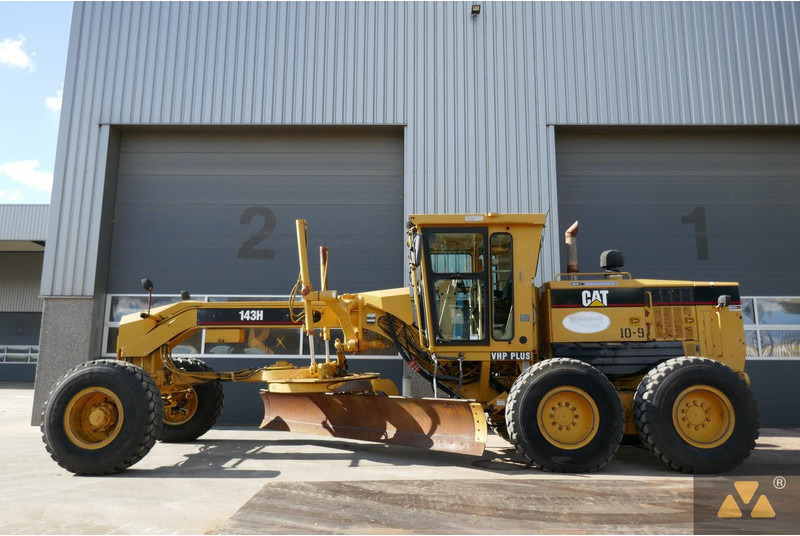 Caterpillar 143H - Порамнувач: слика 1 Caterpillar 143H - Порамнувач: слика 1