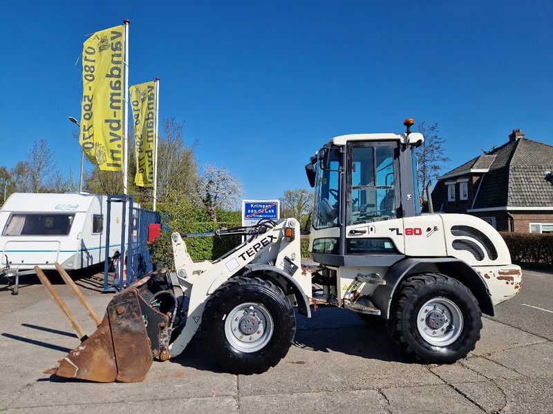 Terex TL80 palletvorken en 4in1-bak - Натоварувач на тркала: слика 1 Terex TL80 palletvorken en 4in1-bak - Натоварувач на тркала: слика 1