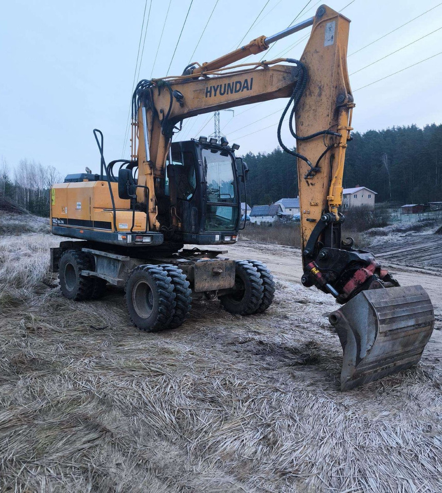 HYUNDAI R 140 W - Багер на тркала: слика 1 HYUNDAI R 140 W - Багер на тркала: слика 1